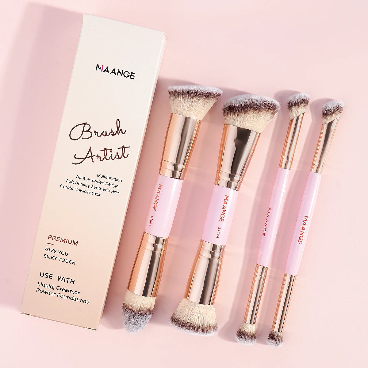 Set of MAANGE makeup brushes with packaging on a pink background