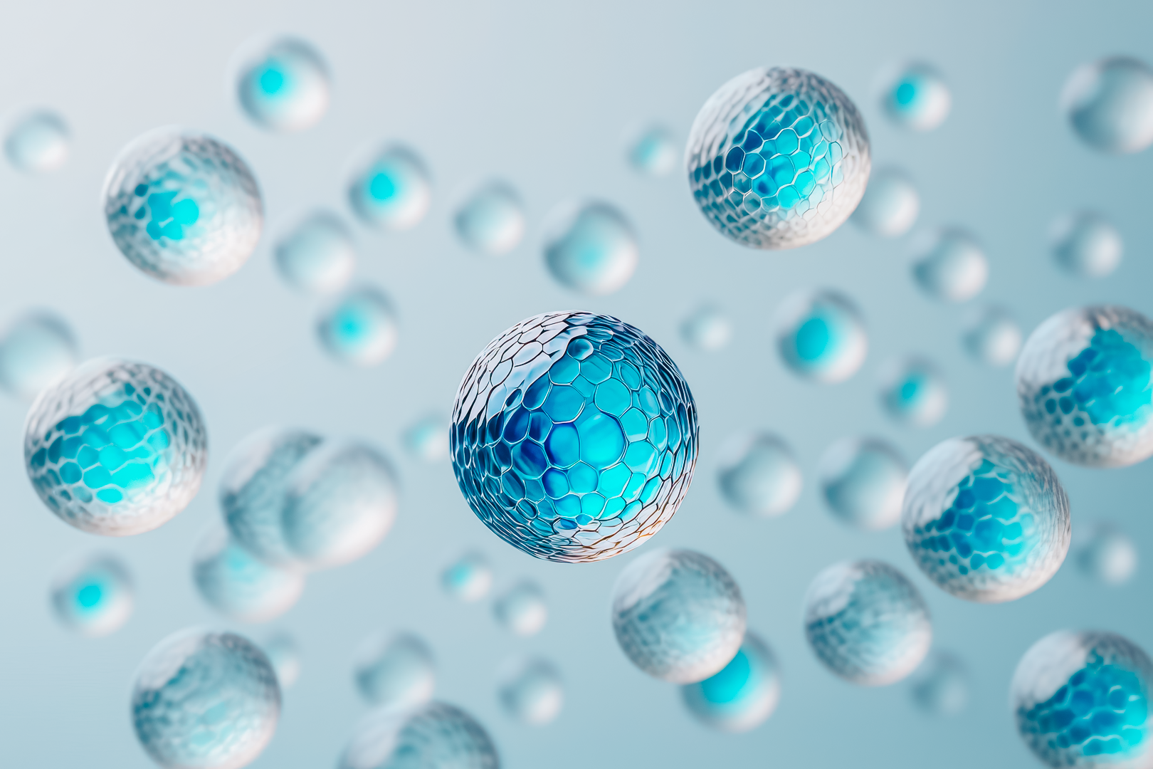 Blue spherical objects with a honeycomb pattern on a light blue background