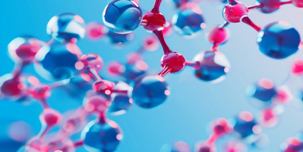 Molecular structure model with blue and pink atoms on a blue background