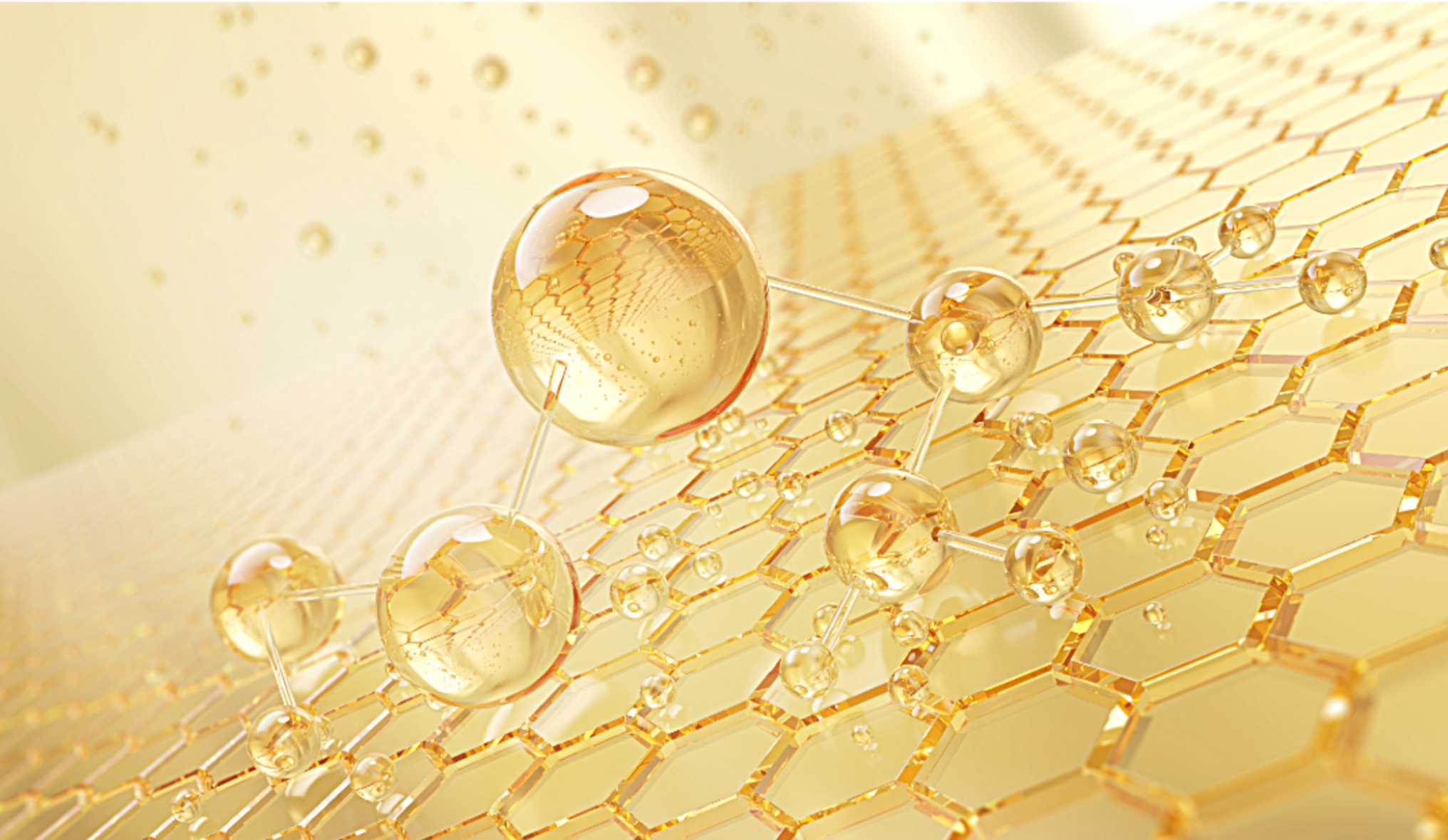 Close-up of gold droplets on a textured gold surface